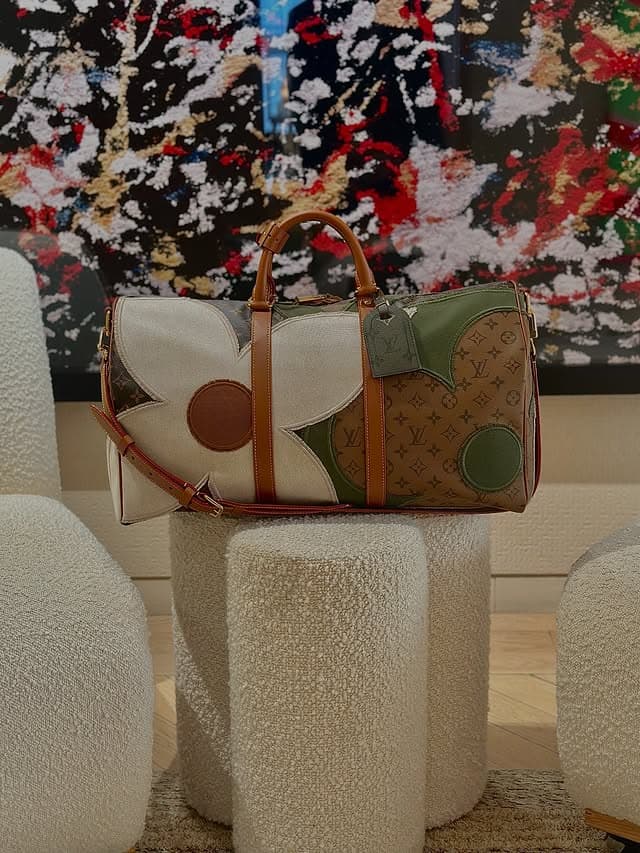 Styling guide: Louis Vuitton Keepall Bandouliere 50 with large floral applique on canvas